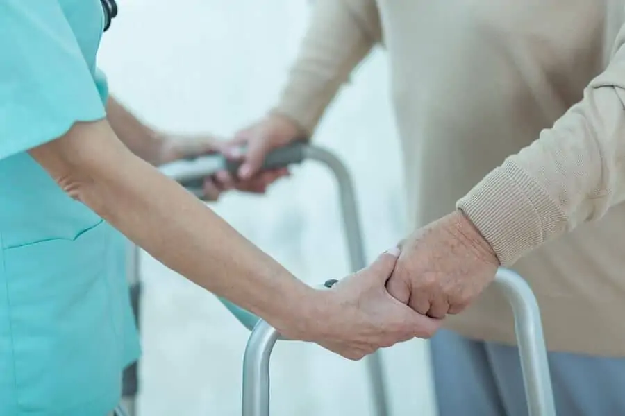 Nurse helping elderly