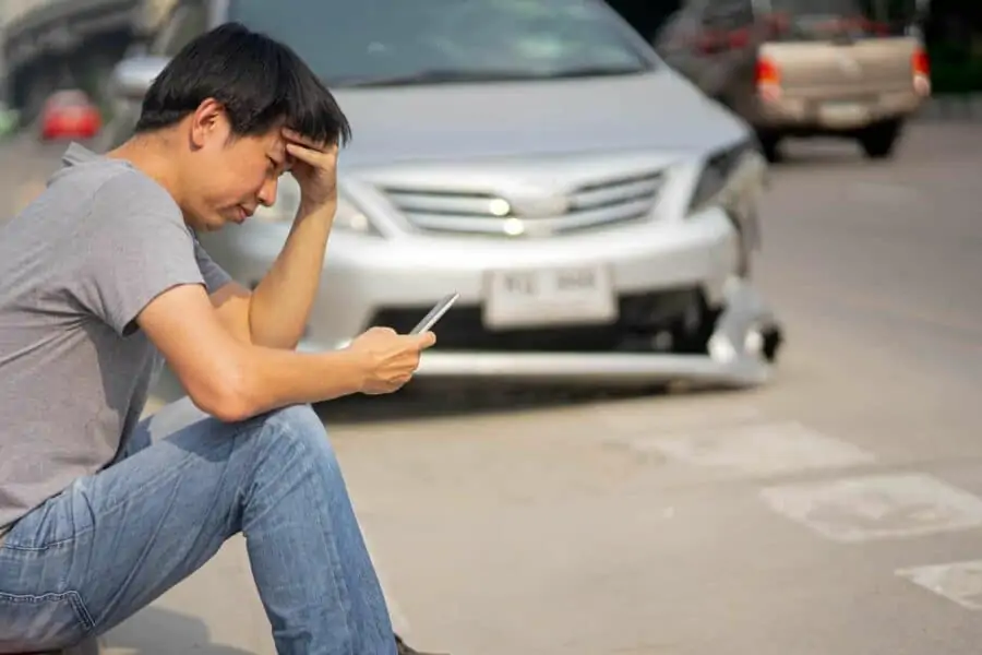 Worrying man checking phone