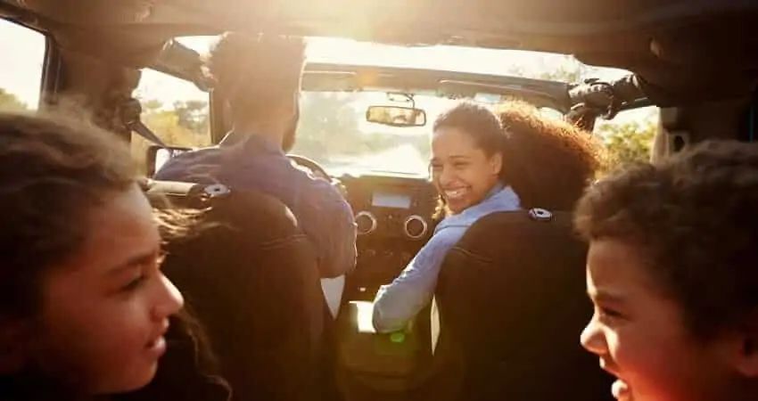 kids arguing in the back seat of moving car