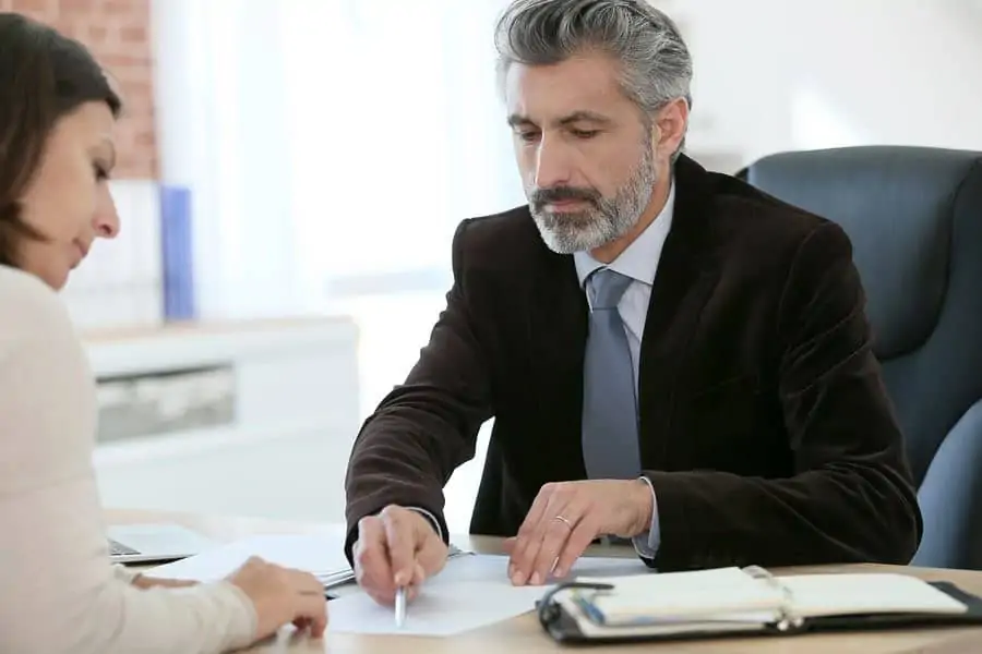 Man and woman reviewing paperwork