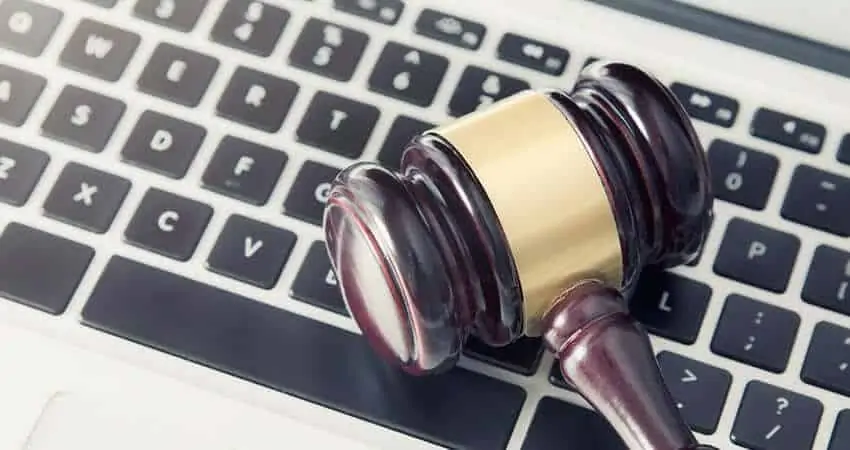 Gavel on laptop keyboard